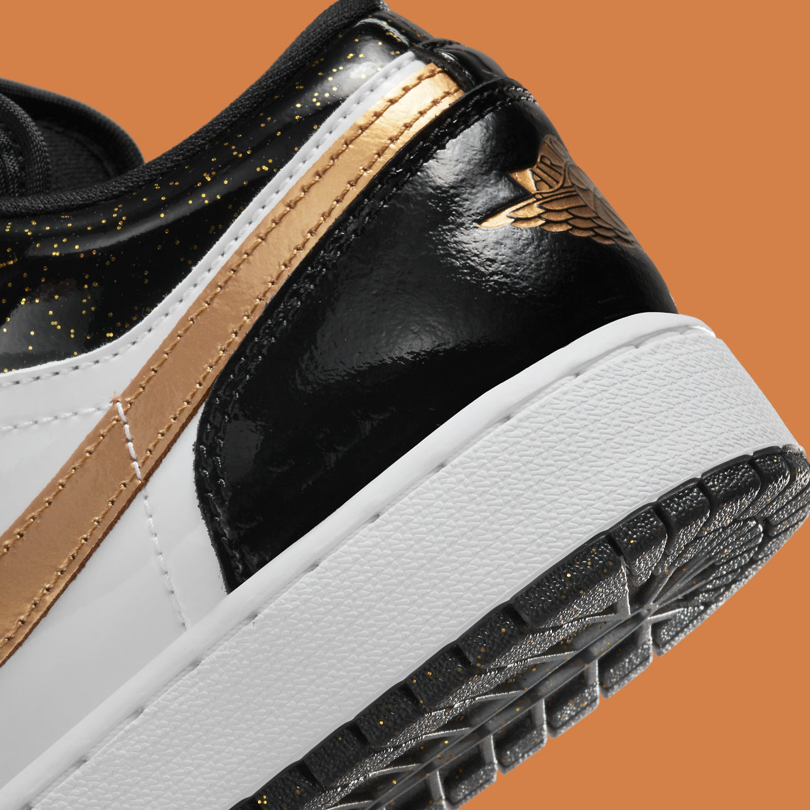 Jordan 1 Low "Metallic Gold Black"