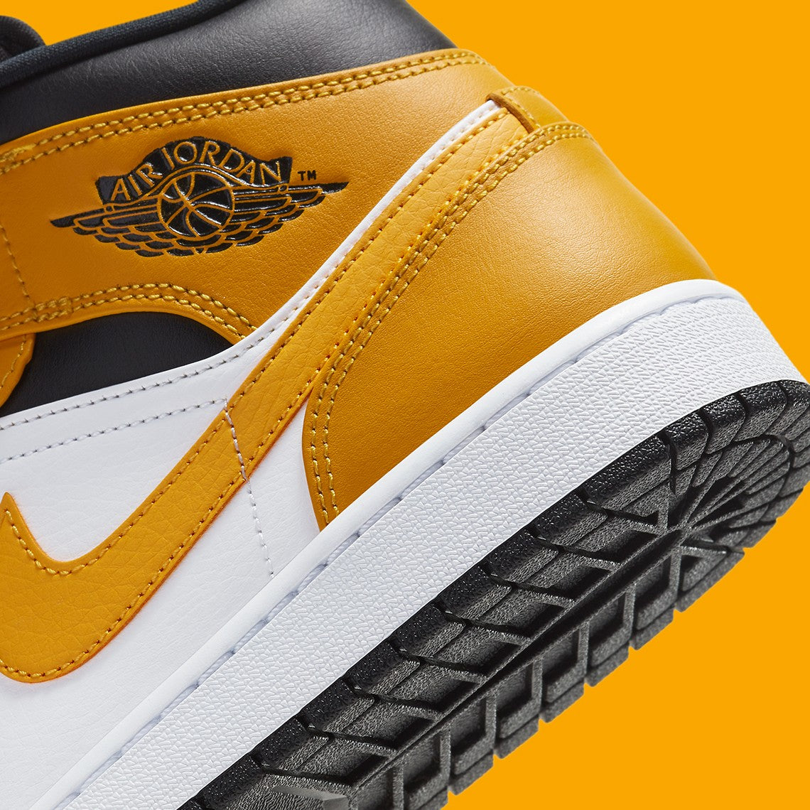 Jordan 1 Mid "University Gold"