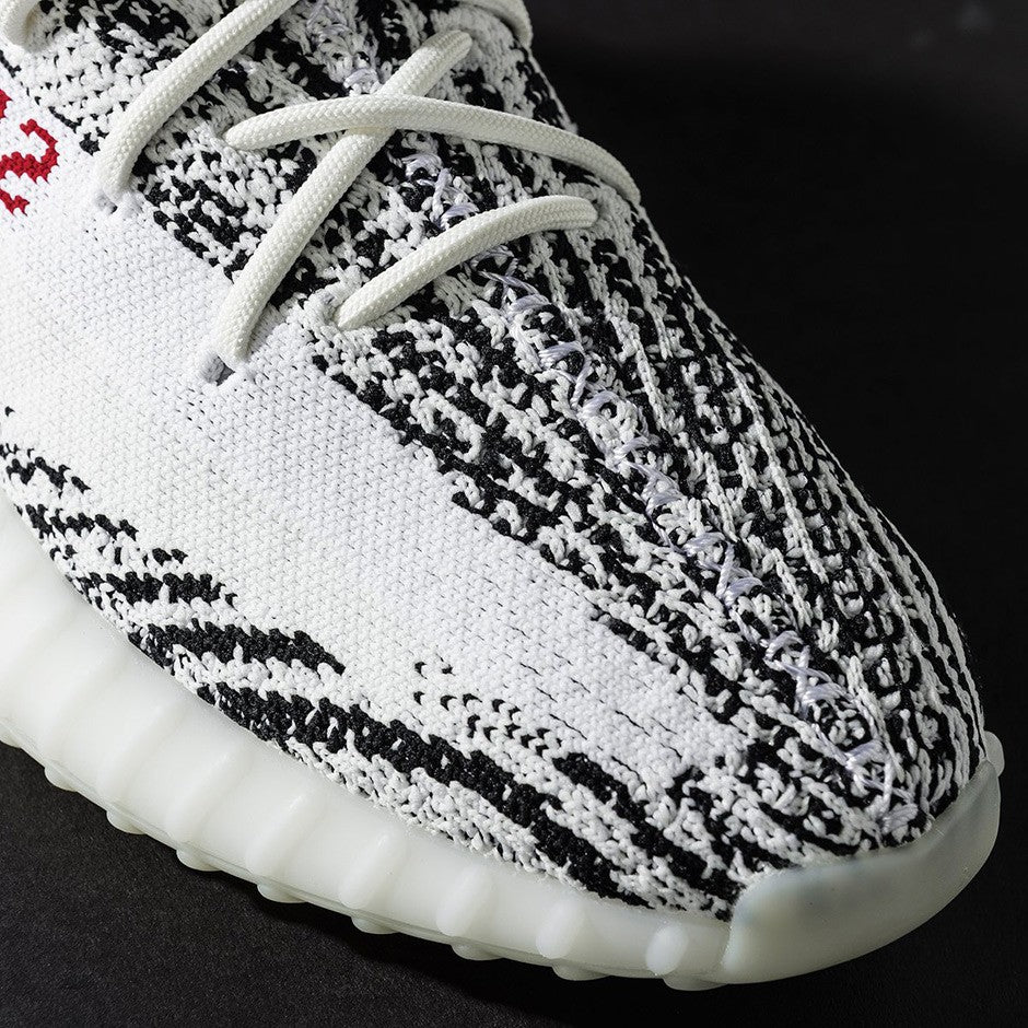 Adidas yeezy zebra precio original white best sale